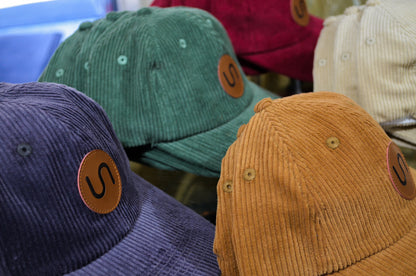 Sprung Cord Cap